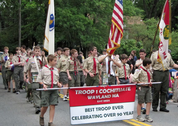 Boy Scouts 'Troop 1 Cochituate' carrying flags
