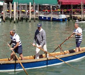 Rowers on Venice's Grand Canal
