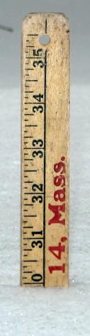 A yardstick outside our mudroom door