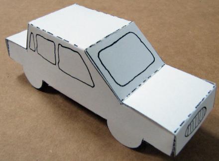 The paper folded into a toy car