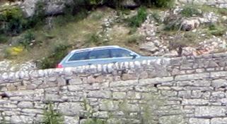 A car climbing up the side of the gorge