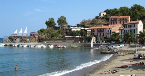 The Neptune, center, overlooking the beach in Collioure